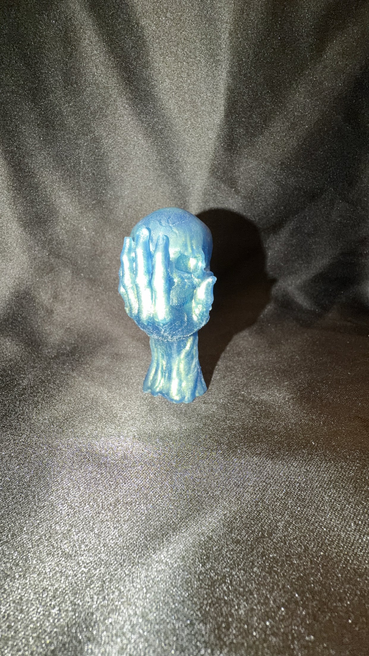 Blue Skull in Hand